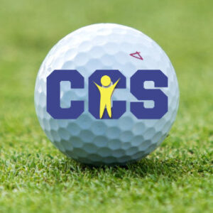 Golf ball on grass with CCS logo